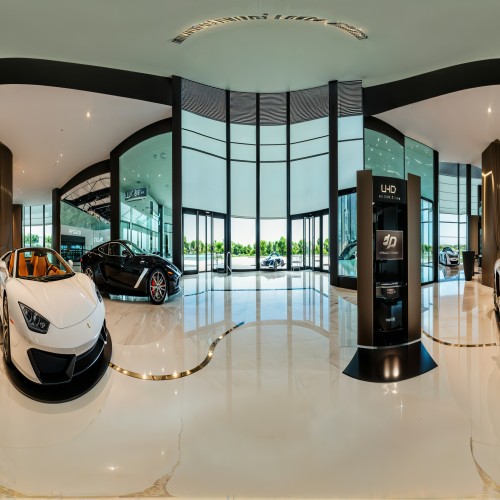 Luxury Car Showroom with High-End Vehicles: A sleek, modern showroom with polished marble floors and large glass windows displaying luxury cars. High-end vehicles like sports cars and SUVs are arranged with ample space around them, under soft spotlights that highlight their shiny, flawless exteriors.