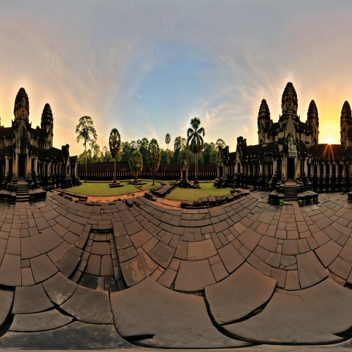 Ancient Temples in Angkor Wat, Cambodia: The iconic stone temples of Angkor Wat at sunrise, with intricate carvings and towering spires. The surrounding jungle and reflection in a nearby pond add to the mystical and awe-inspiring atmosphere of this ancient site.